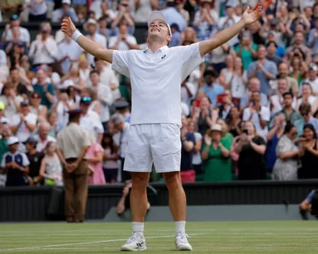 Arthur Fery celebrates his victory over Grigor Dimitrov on Centre Court