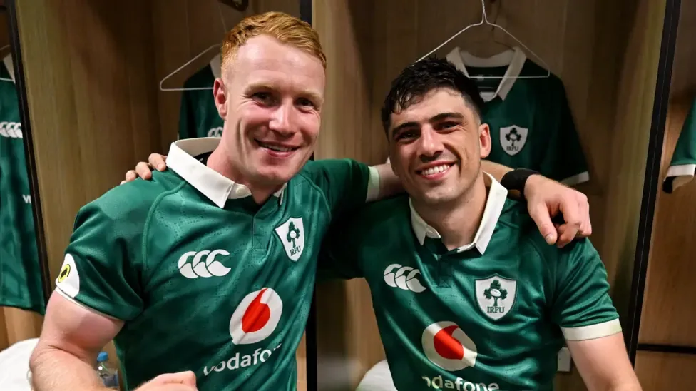 Ciaran Frawley and Jimmy O'Brien sit arm in arm in the Ireland dressing room